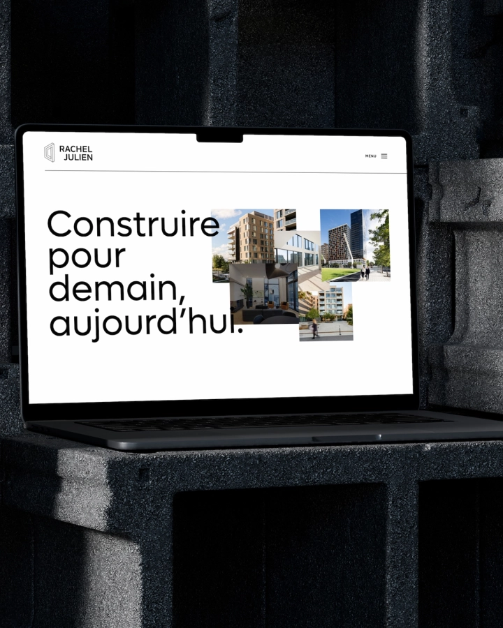 Un ordinateur portable affiche le logo « Rachel Julien », le slogan « Construire pour demain, aujourd’hui. » et un collage de bâtiments et de scènes urbaines.